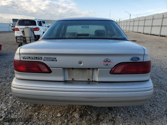 1993 Ford Taurus GL with VIN 1FALP52U6PG231014, listed as a Copart auction lot 69260814 with 156,668 mi miles and Salvage Title. Bid and sale history available at carsss.com. Image 6.