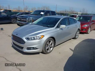 2013 Ford Fusion SE with VIN 3FA6P0HR5DR199082, listed as a IAAI auction lot 41775979 with 142,485 mi miles and . Bid and sale history available at DreamBid. Image 2.