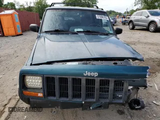 1998 Jeep Cherokee Sport z VIN 1J4FJ68S4WL101110, wystawiony jako Copart lot #57696755 z przebiegiem 218 254 mil mil oraz Szkoda całkowita • Salvage title. Historia ofert i sprzedaży dostępna na DreamBid. Obrazek 5.