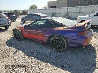 1998 Mitsubishi 3000GT GT z VIN JA3AM84J9WY001795, wystawiony jako Copart lot #74375954 z przebiegiem 106 765 mil mil oraz Szkody całkowita. Historia ofert i sprzedaży dostępna na DreamBid. Obrazek 2.