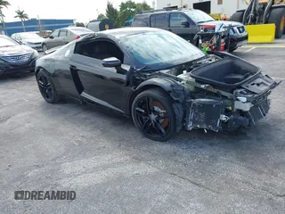 2014 Audi R8 z VIN WUAAUAFG6EN001685, wystawiony jako IAAI lot #42170982 z przebiegiem 19 588 mil mil oraz . Historia ofert i sprzedaży dostępna na DreamBid. Obrazek 1.