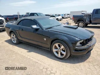 2009 Ford Mustang GT with VIN 1ZVHT85H795126585, listed as a Copart auction lot 64639495 with 140,661 mi miles and Salvage title. Bid and sale history available at DreamBid. Image 4.