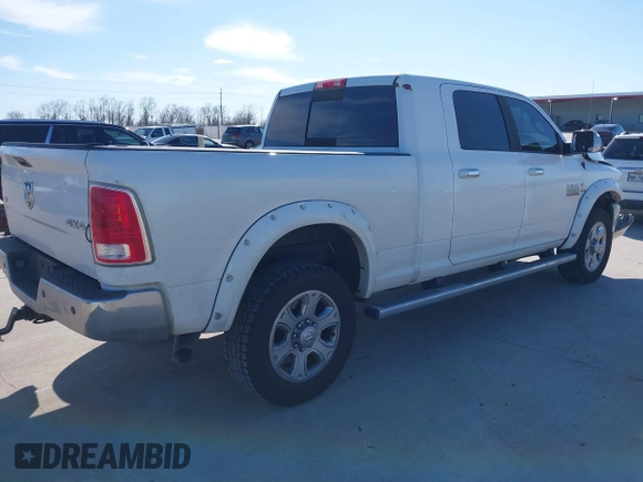 2015 Ram 2500 Laramie with VIN 3C6UR5NL4FG650906, listed as a IAAI auction lot 41657476 with 349,306 mi miles and . Bid and sale history available at DreamBid. Image 4.