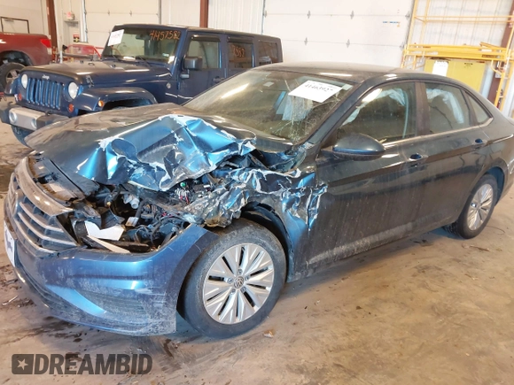 2019 Volkswagen Jetta S z VIN 3VWCB7BU9KM194136, wystawiony jako IAAI lot #41463927 z przebiegiem 103 847 mil mil oraz . Historia ofert i sprzedaży dostępna na DreamBid. Obrazek 17.