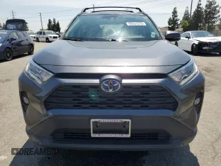 2020 Toyota RAV4 Hybrid XLE with VIN JTMRWRFV7LD063381, listed as a Copart auction lot 60661275 with 70,544 mi miles and Salvage title. Bid and sale history available at DreamBid. Image 5.