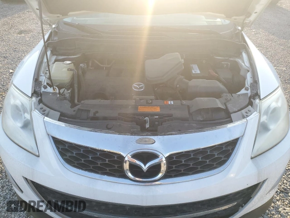 2011 Mazda CX-9 Grand Touring z VIN JM3TB3DV2B0311423, wystawiony jako Copart lot #52713805 z przebiegiem 169 000 mil mil oraz Szkoda całkowita • Salvage title. Historia ofert i sprzedaży dostępna na DreamBid. Obrazek 12.