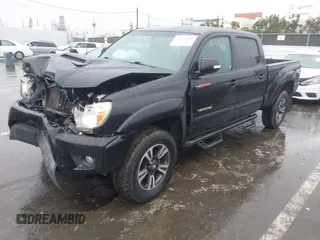 2012 Toyota Tacoma PreRunner with VIN 3TMKU4HN0CM032307, listed as a IAAI auction lot 41576688 with 101,803 mi miles and . Bid and sale history available at DreamBid. Image 2.