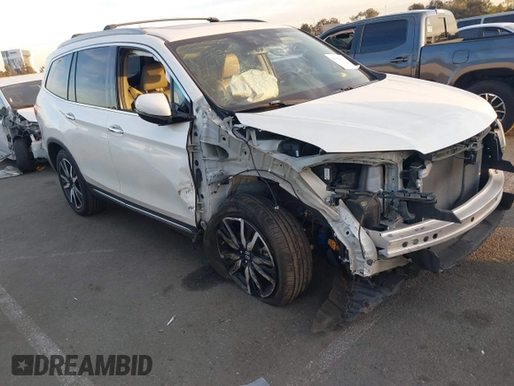 2019 Honda Pilot Touring 8-Passenger with VIN 5FNYF5H97KB005203, listed as a IAAI auction lot 41399930 with 47,267 mi miles and . Bid and sale history available at DreamBid. Image 1.