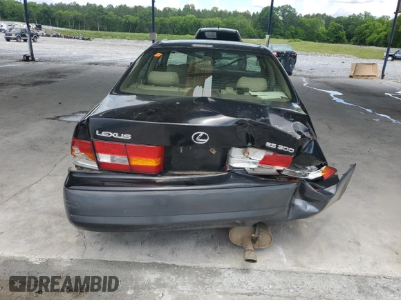 1998 Lexus ES 300 z VIN JT8BF28G7W5048920, wystawiony jako Copart lot #56391015 z przebiegiem 234 109 mil mil oraz Nie do naprawy • Non repairable. Historia ofert i sprzedaży dostępna na DreamBid. Obrazek 6.
