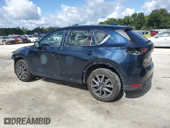 2018 Mazda CX-5 Grand Touring with VIN JM3KFBDMXJ0350499, listed as a Copart auction lot 63475745 with 119,642 mi miles and Salvage title. Bid and sale history available at DreamBid. Image 2.