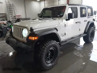 2020 Jeep Wrangler Unlimited Sport S with VIN 1C4HJXDN0LW173694, listed as a IAAI auction lot 41692647 with 56,934 mi miles. Bid and sale history available at carsss.com. Image 18.