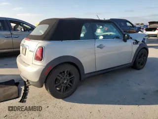 2013 MINI Convertible z VIN WMWZN3C59DT266152, wystawiony jako Copart lot #83379704 z przebiegiem 88 272 mil mil oraz Szkoda całkowita • Salvage title. Historia ofert i sprzedaży dostępna na DreamBid. Obrazek 3.