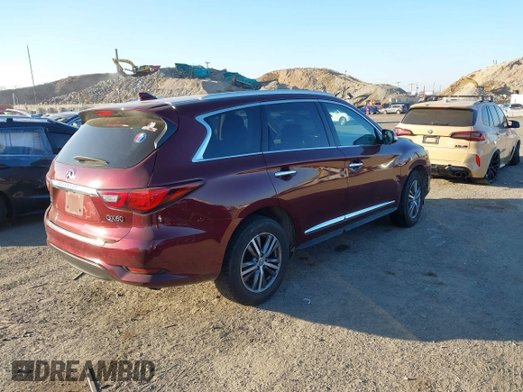 2020 Infiniti QX60 Luxe with VIN 5N1DL0MM0LC511566, listed as a IAAI auction lot 40879519 with 90,479 mi miles and . Bid and sale history available at DreamBid. Image 4.
