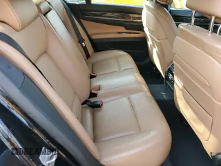 2015 BMW 7 Series 750i xDrive with VIN WBAYB6C53FD966042, listed as a Copart auction lot 69387464 with 64,977 mi miles and Salvage Title. Bid and sale history available at carsss.com. Image 10.