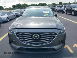 2021 Mazda CX-9 Touring с VIN JM3TCACY4M0511512, выставлен на аукционе IAAI как лот 42376544 с пробегом 50 485 миль миль и . История ставок и продаж доступна на DreamBid. Изображение 12.