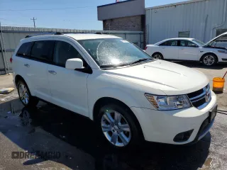2012 Dodge Journey Crew with VIN 3C4PDCDGXCT146909, listed as a Copart auction lot 49216555 with 161,436 mi miles and Salvage title. Bid and sale history available at DreamBid. Image 4.