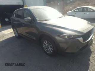 2023 Mazda CX-5 2.5 S Carbon Edition with VIN JM3KFBCM5P0190753, listed as a IAAI auction lot 41730043 with 57,539 mi miles. Bid and sale history available at carsss.com. Image 1.