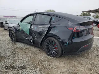 2024 Tesla Model Y Performance with VIN 7SAYGDEF1RF028278, listed as a Copart auction lot 48900935 with 41,606 mi miles and Salvage Title. Bid and sale history available at DreamBid. Image 2.