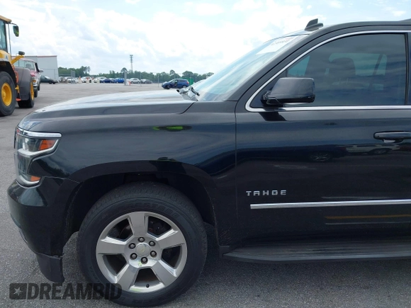 2015 Chevrolet Tahoe LT with VIN 1GNSCBKC4FR145119, listed as a IAAI auction lot 42309931 with 99,408 mi miles and . Bid and sale history available at DreamBid. Image 20.