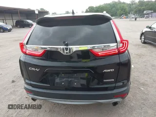 2017 Honda CR-V Touring with VIN 2HKRW2H96HH672017, listed as a IAAI auction lot 42151118 with 144,527 mi miles and . Bid and sale history available at carsss.com. Image 17.