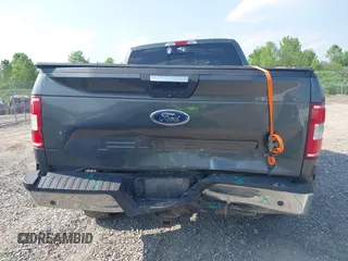 2018 Ford F-150 XL with VIN 1FTFX1E58JFD92806, listed as a IAAI auction lot 42424589 with 144,476 mi miles and . Bid and sale history available at DreamBid. Image 6.