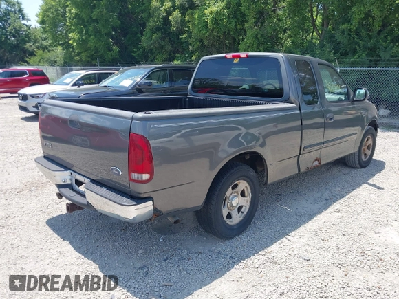 2002 Ford F-150 XL with VIN 1FTRX17W22NA43571, listed as a IAAI auction lot 42697861 with Not provided miles and . Bid and sale history available at DreamBid. Image 4.