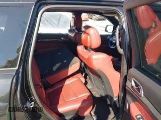 2017 Jeep Grand Cherokee SRT with VIN 1C4RJFDJ2HC696025, listed as a IAAI auction lot 41863274 with 126,949 mi miles. Bid and sale history available at carsss.com. Image 8.