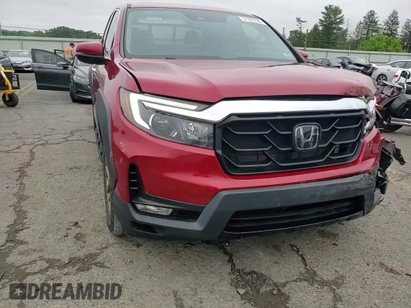 2021 Honda Ridgeline RTL-E with VIN 5FPYK3F73MB017991, listed as a Copart auction lot 61307225 with 33,308 mi miles and Salvage title. Bid and sale history available at DreamBid. Image 13.
