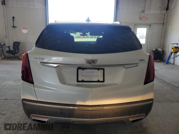 2020 Cadillac XT5 Premium Luxury FWD with VIN 1GYKNCRS9LZ235779, listed as a Copart auction lot 47775965 with 59,501 mi miles and Salvage Title. Bid and sale history available at carsss.com. Image 6.