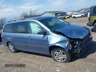 2007 Honda Odyssey EX-L with VIN 5FNRL38727B092077, listed as a IAAI auction lot 41972810 with 211,770 mi miles and . Bid and sale history available at DreamBid. Image 14.