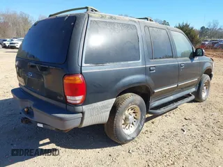 2000 Ford Explorer with VIN 1FMDU72XXYUB63358, listed as a IAAI auction lot 41771800 with 165,623 mi miles and . Bid and sale history available at DreamBid. Image 4.