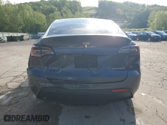 2022 Tesla Model Y Long Range z VIN 7SAYGDEE1NF430383, wystawiony jako Copart lot #56208825 z przebiegiem 60 612 mil mil oraz Szkoda całkowita • Salvage title. Historia ofert i sprzedaży dostępna na DreamBid. Obrazek 6.