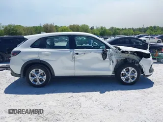 2023 Honda HR-V LX with VIN 3CZRZ1H33PM717656, listed as a IAAI auction lot 42022154 with 21,196 mi miles and . Bid and sale history available at DreamBid. Image 12.