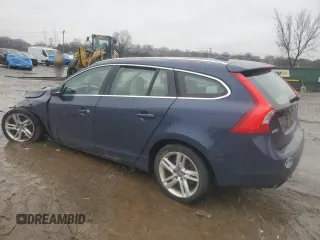2015 Volvo V60 T5 Drive-E Premier z VIN YV140MEK9F1233763, wystawiony jako Copart lot #45242415 z przebiegiem 97 916 mil mil oraz Szkoda całkowita • Salvage title. Historia ofert i sprzedaży dostępna na DreamBid. Obrazek 2.