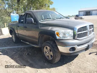 2007 Dodge 1500 SLT with VIN 1D7HU18P37S239450, listed as a IAAI auction lot 40520938 with 211,609 mi miles. Bid and sale history available at carsss.com. Image 1.