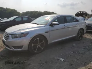 2014 Ford Taurus SEL with VIN 1FAHP2E8XEG184523, listed as a Copart auction lot 67643764 with 157,851 mi miles and Salvage Title. Bid and sale history available at carsss.com. Image 1.