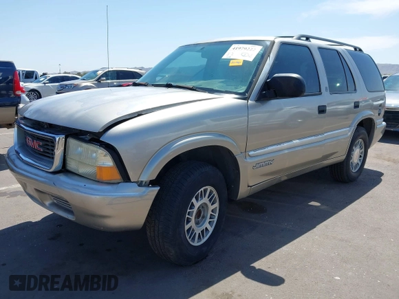 1999 GMC Jimmy SLE with VIN 1GKDT13W5X2539067, listed as a IAAI auction lot 41979222 with 1 mi miles. Bid and sale history available at carsss.com. Image 2.