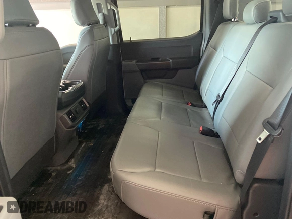 2022 Ford F-150 Lightning Pro with VIN 1FTVW1EL5NWG11725, listed as a IAAI auction lot 42832825 with 5,044 mi miles and . Bid and sale history available at DreamBid. Image 21.