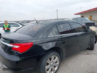 2012 Chrysler 200 Touring with VIN 1C3CCBBG0CN328959, listed as a IAAI auction lot 41451319 with NaN miles. Bid and sale history available at carsss.com. Image 4.