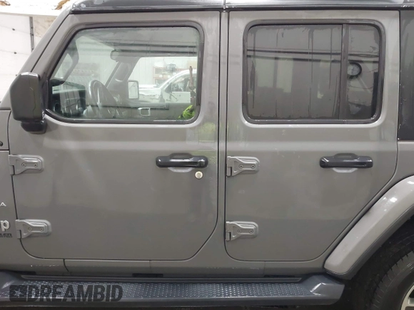 2019 Jeep Wrangler Unlimited Sahara with VIN 1C4HJXEG9KW656454, listed as a IAAI auction lot 41648236 with 75,403 mi miles and . Bid and sale history available at DreamBid. Image 15.
