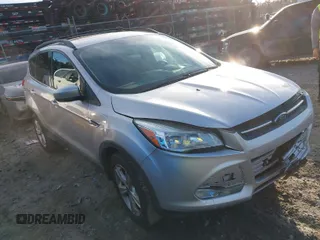 2014 Ford Escape SE with VIN 1FMCU9G96EUC53975, listed as a IAAI auction lot 41342661 with 128,594 mi miles. Bid and sale history available at carsss.com. Image 1.