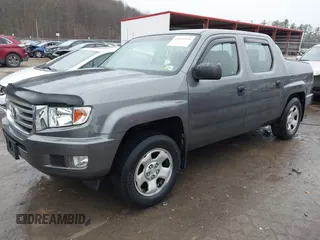 2012 Honda Ridgeline RT with VIN 5FPYK1F24CB456298, listed as a IAAI auction lot 40869948 with 123,329 mi miles and . Bid and sale history available at DreamBid. Image 18.