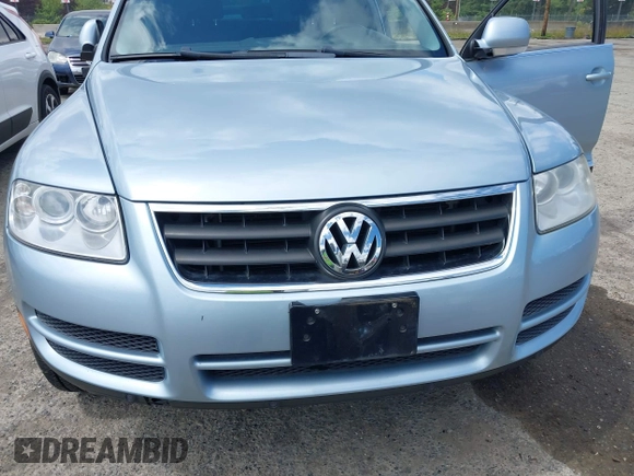 2007 Volkswagen Touareg V6 z VIN WVGZE77L37D001840, wystawiony jako IAAI lot #42323795 z przebiegiem 176 486 mil mil oraz . Historia ofert i sprzedaży dostępna na DreamBid. Obrazek 6.