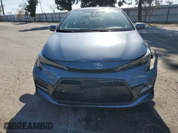 2022 Toyota Corolla SE with VIN JTDS4MCE6N3510323, listed as a Copart auction lot 49559575 with 38,024 mi miles and Salvage Title. Bid and sale history available at carsss.com. Image 5.
