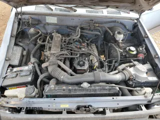 1990 Toyota Pickup DX с VIN JT4RN81P1L5069533, выставлен на аукционе Copart как лот 78433024 с пробегом 277 999 миль миль и Списание • Salvage title. История ставок и продаж доступна на DreamBid. Изображение 11.