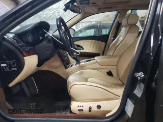 2012 Maserati Quattroporte S z VIN ZAM39JKAXC0065906, wystawiony jako Copart lot #52009945 z przebiegiem 55 058 mil mil oraz Szkody całkowita. Historia ofert i sprzedaży dostępna na DreamBid. Obrazek 7.