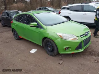 2012 Ford Focus SE with VIN 1FAHP3K26CL125074, listed as a IAAI auction lot 41790997 with 156,993 mi miles. Bid and sale history available at carsss.com. Image 1.