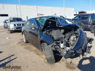 2014 Chevrolet Malibu LTZ with VIN 1G11J5SX5EF217016, listed as a IAAI auction lot 41629836 with 1 mi miles. Bid and sale history available at carsss.com. Image 1.