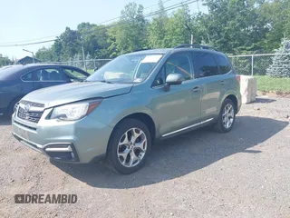 2017 Subaru Forester Touring with VIN JF2SJAWC8HH579492, listed as a IAAI auction lot 42571986 with 57,228 mi miles and . Bid and sale history available at DreamBid. Image 17.