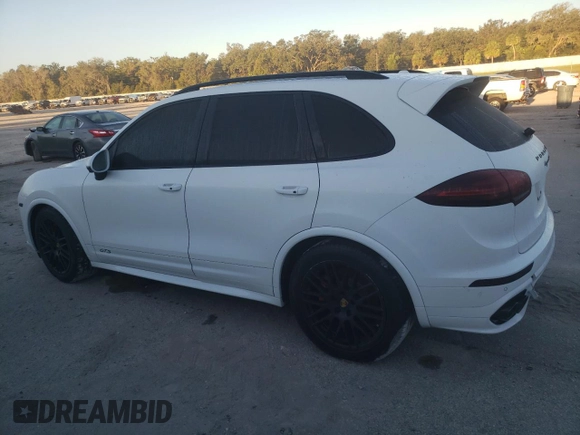 2017 Porsche Cayenne GTS with VIN WP1AD2A29HLA83277, listed as a Copart auction lot 76765974 with 47,838 mi miles and Salvage title. Bid and sale history available at DreamBid. Image 2.